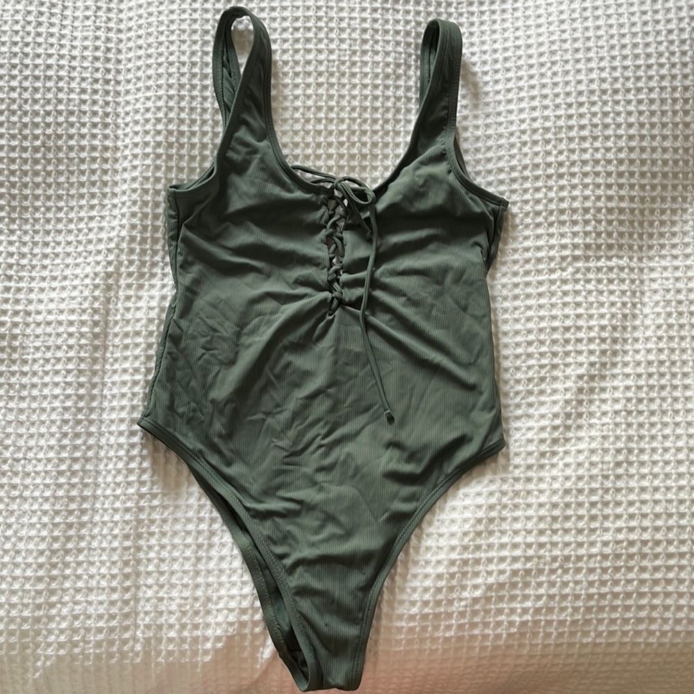 Green xhiliration one piece swim suit size M